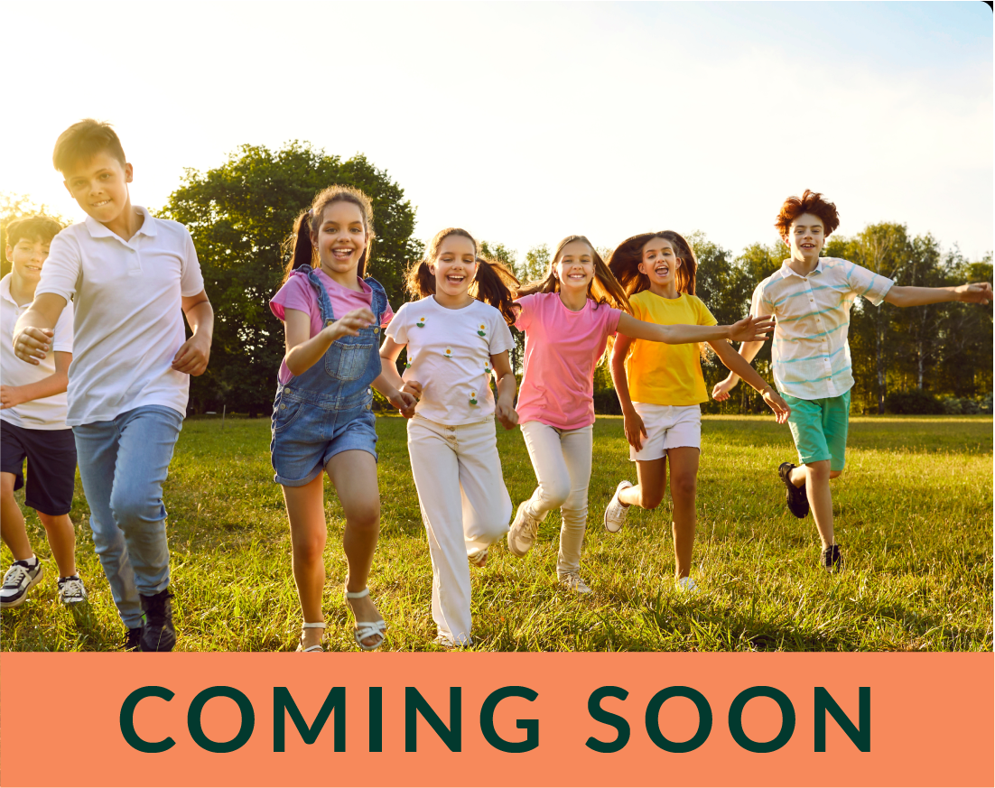 comingsoon_goalgetters A group of seven joyful youths run on green grass in the summer. The text Coming Soon appears across the bottom of the image.
